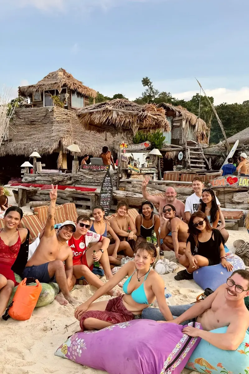 Bean bags on the sand in front of a beach bar